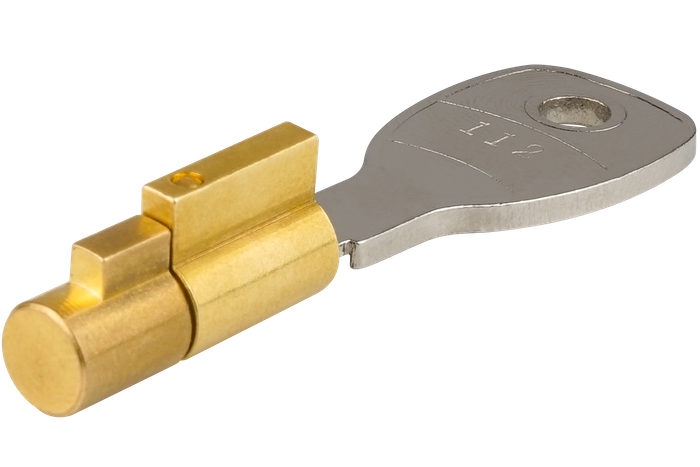 Låseinnsats som sikrer Unitrailer-spjeldet