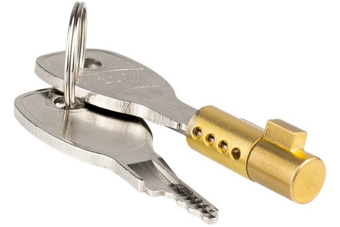 Låseinnsats som sikrer Unitrailer-spjeldet